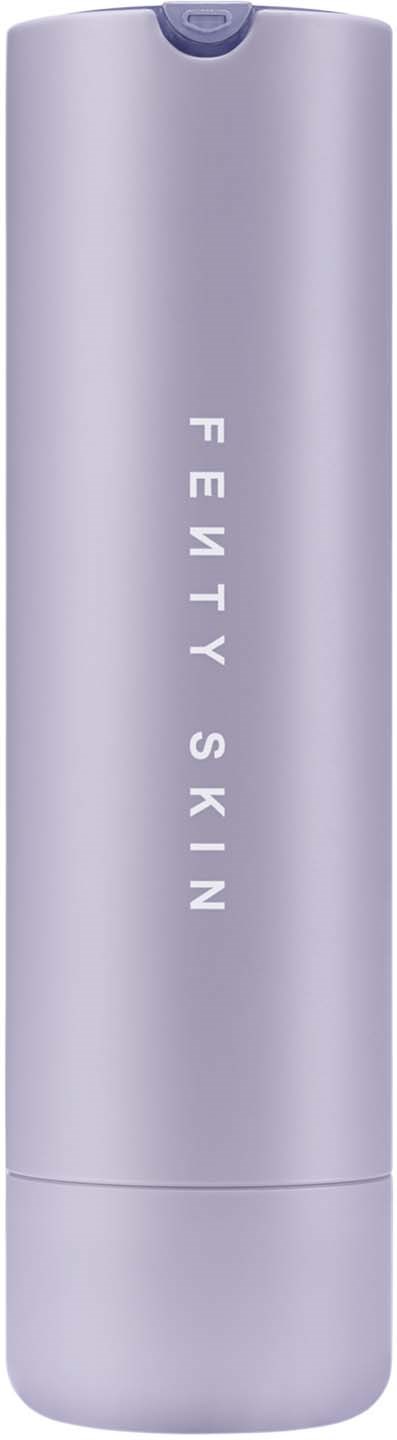 A tall, purple cylindrical bottle with the words "Fenty Skin" written down the side.