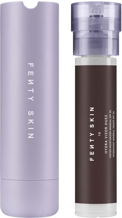 A purple bottle and a brown pump bottle for Fenty Skin skincare products.