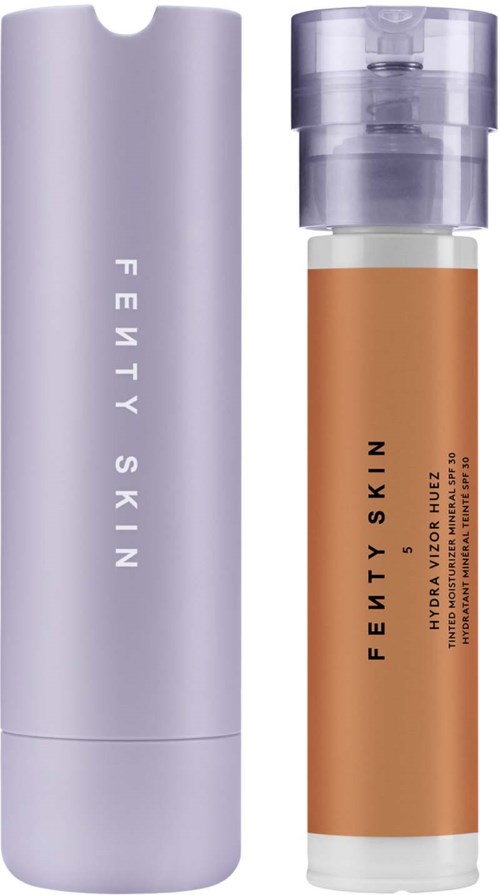 The image shows a purple cylindrical bottle and a clear pump container labeled Fenty Skin and Hydra Vizor.