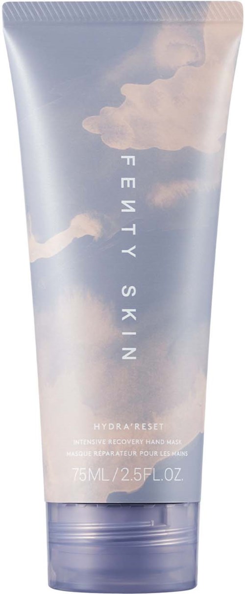 En handkrämstub med himmel- och molndesign, märkt 'FEVITY SKIN' och 'HYDRA RESET', 75 ml.