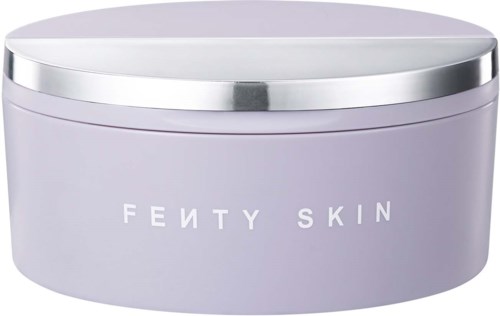 A purple jar with silver lid, labeled Fenty Skin, likely for skincare products.