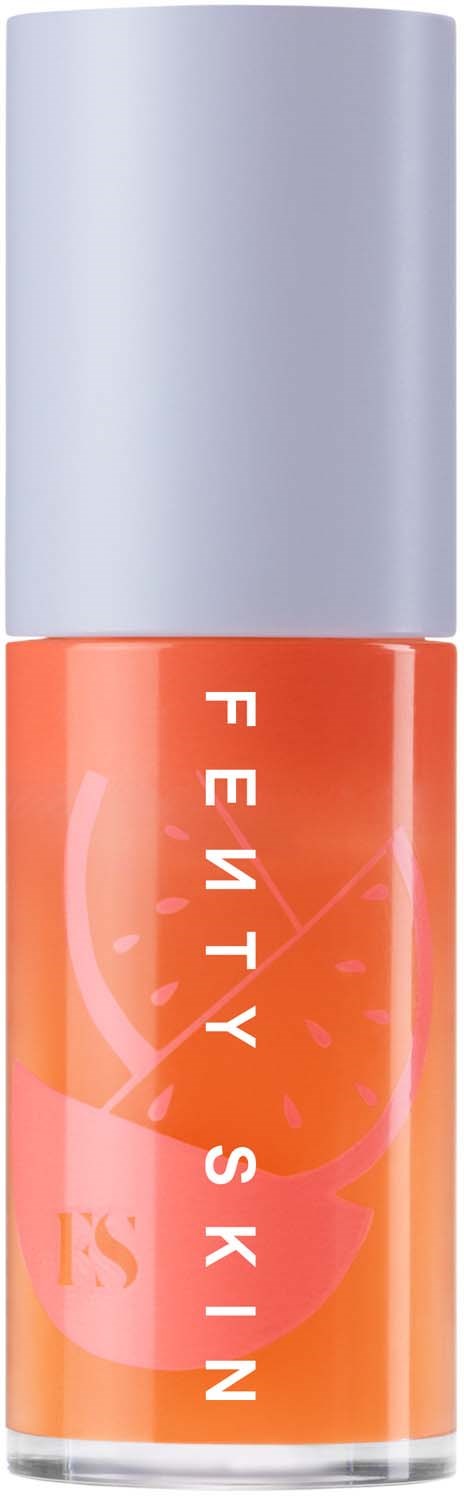 Lip gloss in a transparent tube with a silver cap, labeled 'Fenty Skin'.