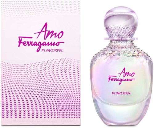 Hajuvesipullo ja rasia, joissa pinkkiä tekstiä: "Amo Ferragamo Flowerful" ja kukkakuvioita.