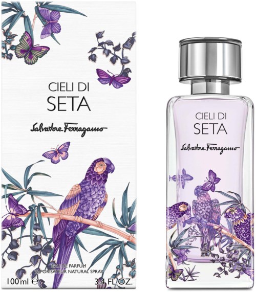 Hajuvesipullo ja laatikko, joissa on violetteja perhosia ja lintuja, nimeltä 'Cieli Di Seta' Salvatore Ferragamon.