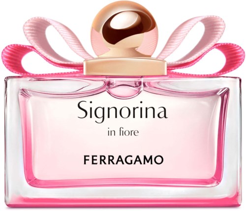 Vaaleanpunainen hajuvesipullo, kultainen korkki, vaaleanpunaiset nauhat, teksti 'Signorina in fiore FERRAGAMO.'