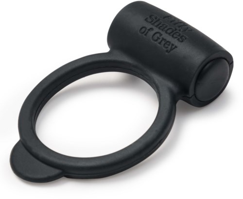 Ein schwarzer Ring mit einem kleinen Zylinder oben, beschriftet "Shade of Grey," möglicherweise ein Ringhalter oder Zubehör.