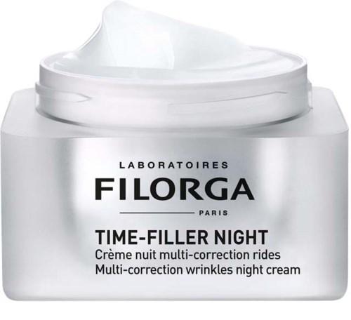 Purkkikäyttöön tarkoitettu yövoide, jonka nimi on 'Time-Filler Night' Filorga-merkkiseltä, ja päällä on valkoinen kerma.