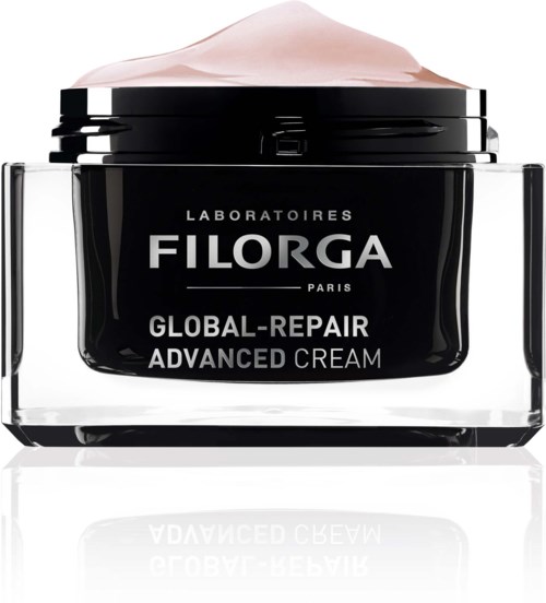Een zwarte pot van Filorga Global-Repair Advanced Cream met roze crème binnenin, gelabeld met merk en productnaam.