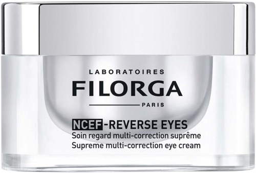 Ein Glas mit FILORGA-Augencreme, silberner Deckel, schwarz-weißer Etikett. Für Augenkorrektur.