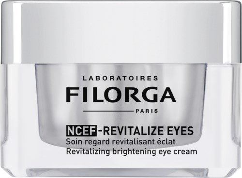 Een zilveren potje oogcrème met label 'NCEF-Revitalize Eyes' van Filorga Paris, voor verhelderende en revitaliserende ogen.
