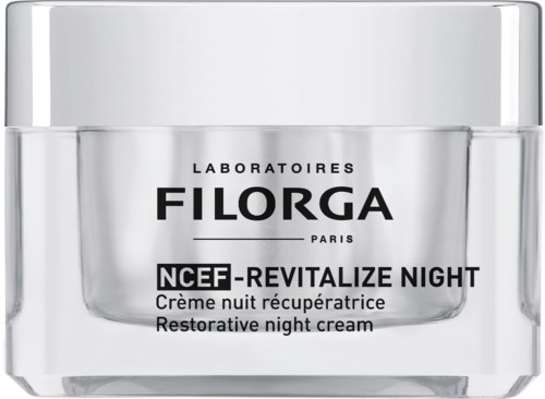 A small, clear jar of night cream with white lid, labeled 'Filorga NCEF-Revitailze Night.'