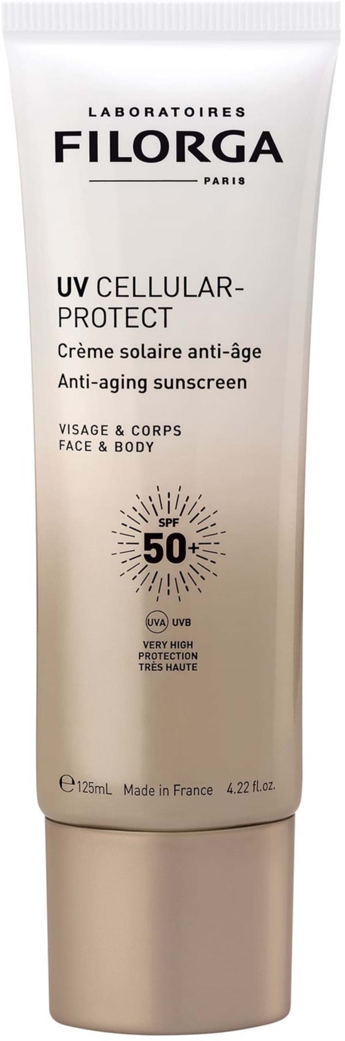 A white tube of Filorga UV Cellular-Protect anti-aging sunscreen with SPF 50 for face and body.