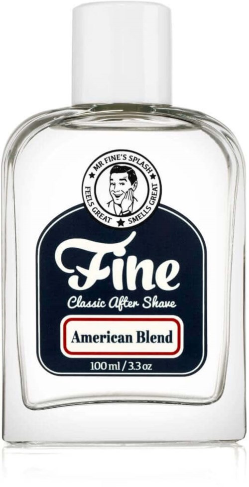 A clear bottle of men's aftershave lotion with a white cap, labeled "Fine" and "American Blend."