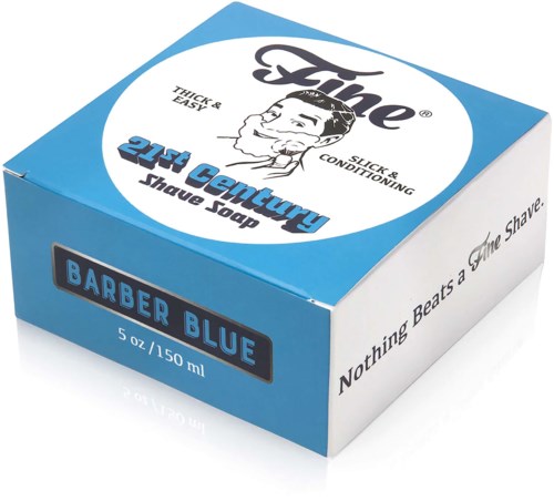 A blue and white box shows 2-in-1 men's shaving soap for thick, easy, slick, and conditioning shave. It says Barber Blue.
