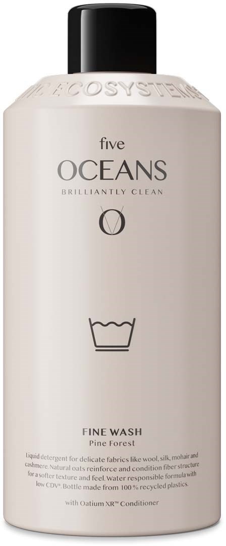 A white bottle labeled 'five OCEANS' with a black cap, featuring a wash icon and descriptive text.