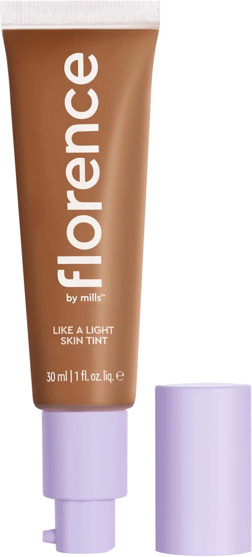 En brun tub märkt 'Florence' med vit text, visar en makeupprodukt för ljus hy.