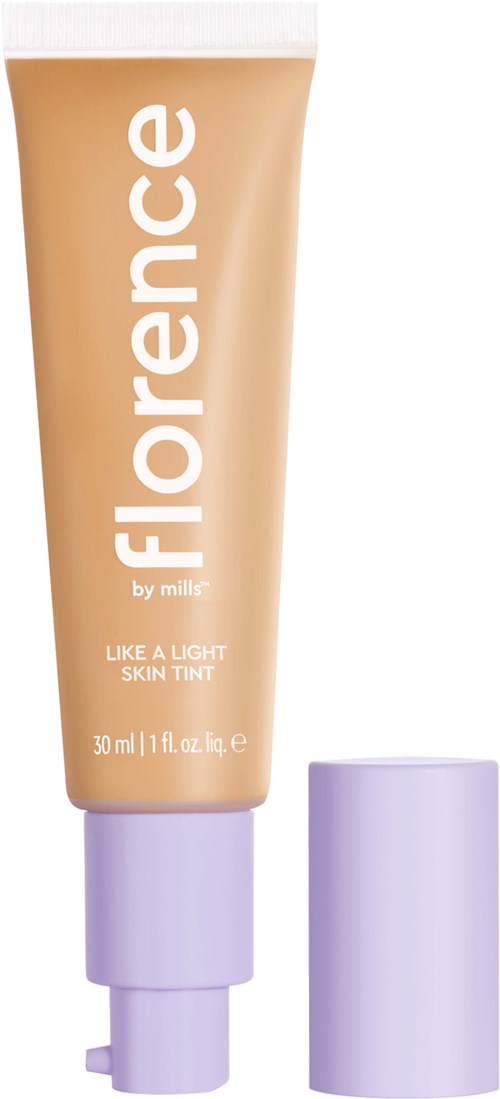 En beige tube med lila lock som är märkt 'Florence', troligtvis en makeup- eller hudvårdsprodukt.