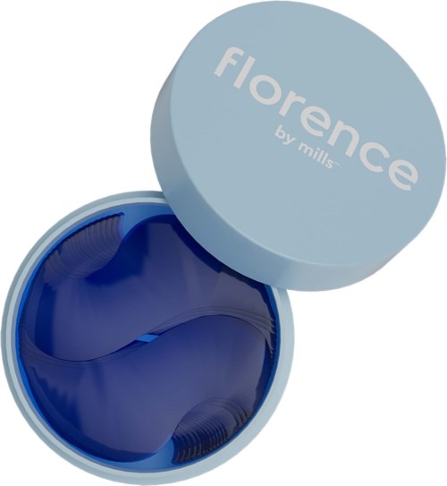 En blå kontaktlins i ett runt förvaringslock med ljusblått lock, märkt "florence by mils."