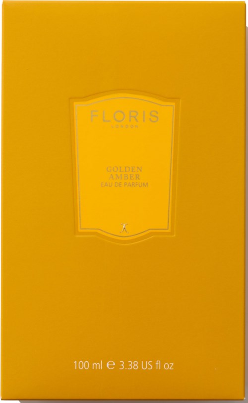 A yellow box with text about Floris Golden Amber perfume, size 100ml, in simple language.