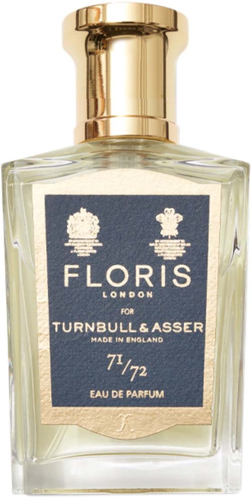 Een parfumfles met een gouden dop en een blauw en beige label, met vermelding van Florence, Londen en een specifieke naam.