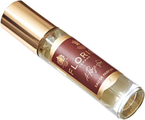 Ein Parfümflasche mit goldener Kappe und braunem Etikett mit "FLORIS London" und "Eau de Parfum".
