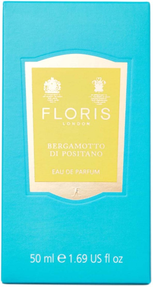 Eine Parfümbox mit gelbem Etikett, blauer Verpackung und Text 'Floris London Bergamotto di Positano Eau de Parfum, 50ml.'