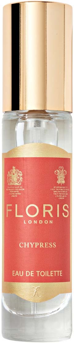 A small perfume bottle with a pink label and gold cap, labeled 'Floris London Chypress Eau de Toilette.'