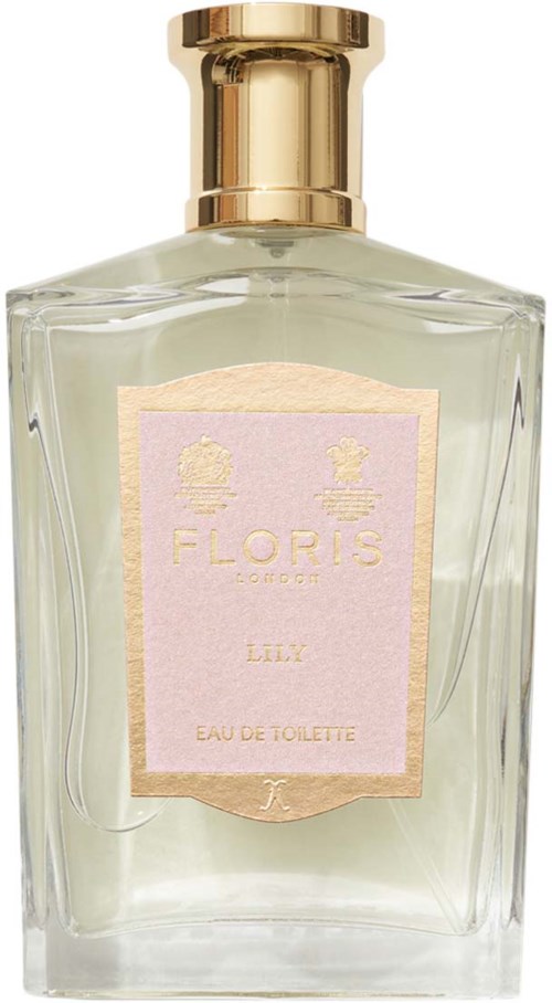 Een heldere glazen parfumfles met een gouden dop en een roze label dat zegt 'Floris London Lily Eau de Toilette.'
