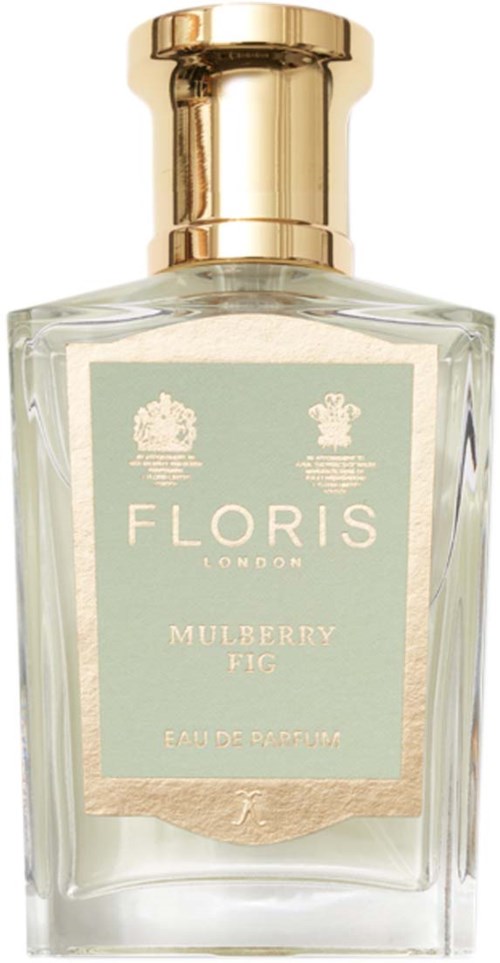 Een parfumfles met een gouden dop, doorzichtig glas en een label met de tekst 'Floris London Mulberry Fig Eau de Parfum.'