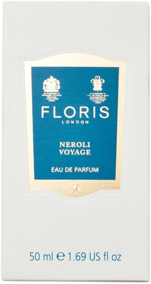 Een witte doos met een blauw label met Fleur de Lis-symbolen, productnaam 'Floris London Neroli Voyage Eau de Parfum' en volumebeperkingen.