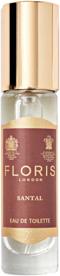 Een klein parfumflesje met een gouden dop, gemerkt 'Florís London Santal Eau de Toilette.'