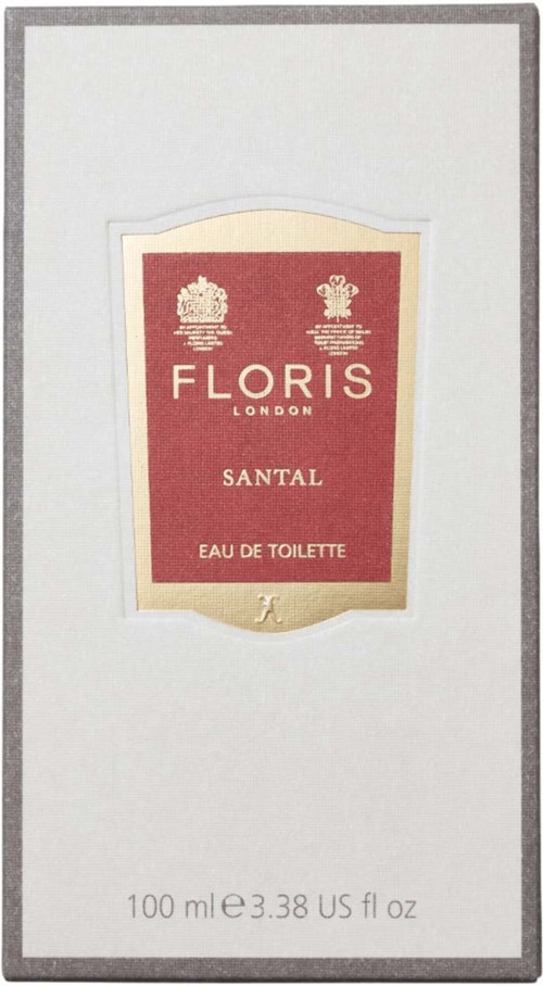 Ein Parfühschachtel mit weißem Hintergrund und rotem Etikett, das 'Florix, Santal, Eau de Toilette' sagt.