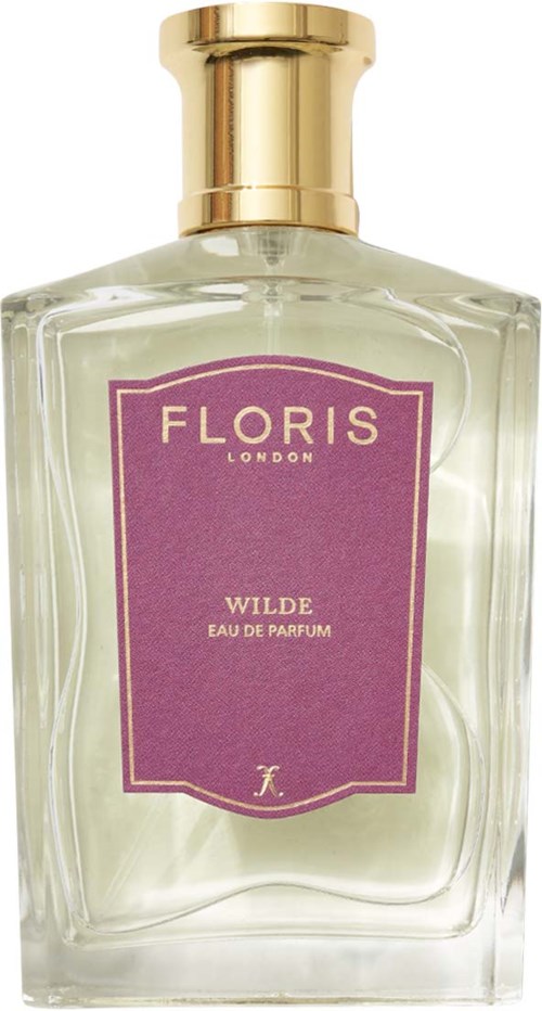 A clear perfume bottle with a purple label and gold cap, labeled 'Floris London' and 'Wilde Eau de Parfum'.