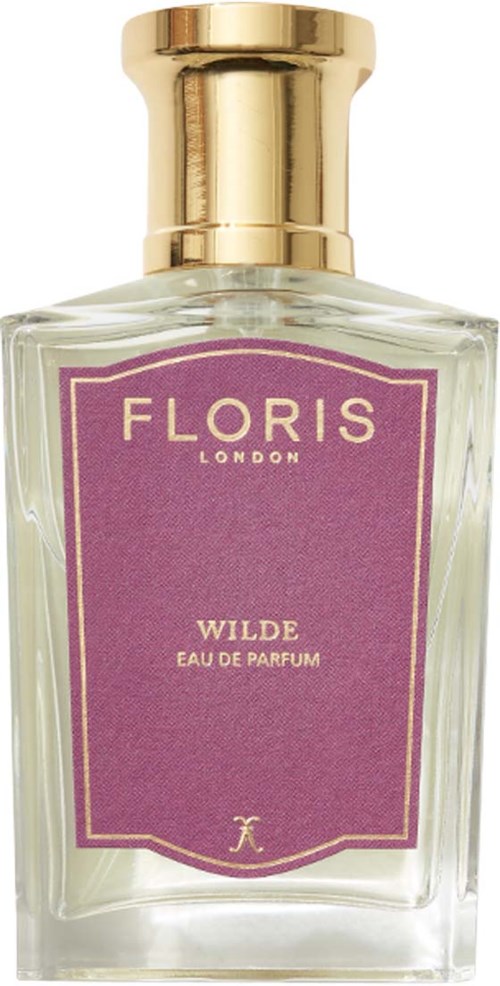 Een parfumfles met een paarse label en gouden dop, gemarkeerd 'Floris Wilde Eau de Parfum.'