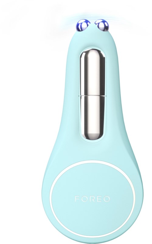 Een blauw apparaat met ogen, een metalen deel in het midden en een cirkelvormig gebied met 'FOREO' onderaan.