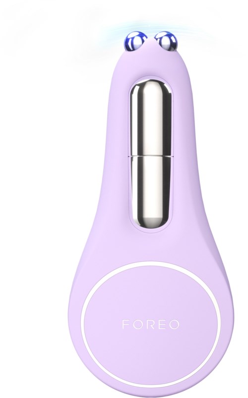 Een paarse apparaat met ogen, gevormd als een grappig cartoonfiguur, met het label "FOREO."