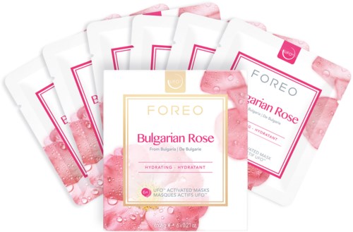 Zes verpakkingen van gezichtsmaskers met 'Bulgarian Rose' tekst en roze waterdruppeldesign.