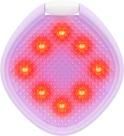 En lampa med flera glödlampor avger varmt ljus, omgiven av en lila och rosa glödande bas.