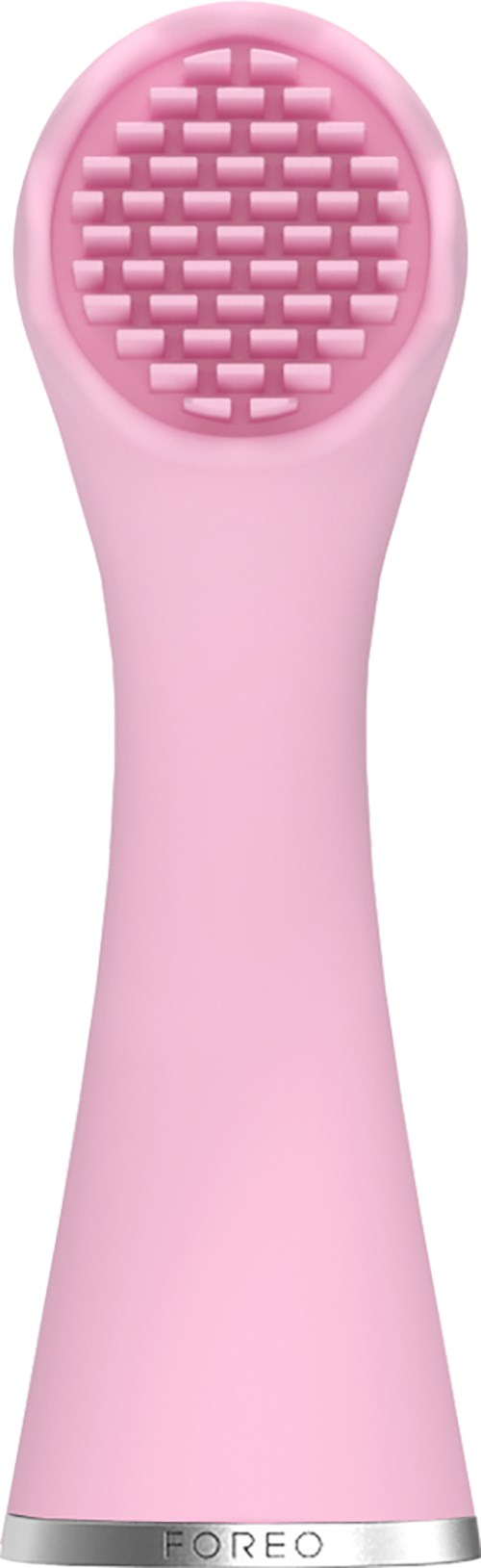 A pink facial cleansing brush with a textured head and a sleek handle.
