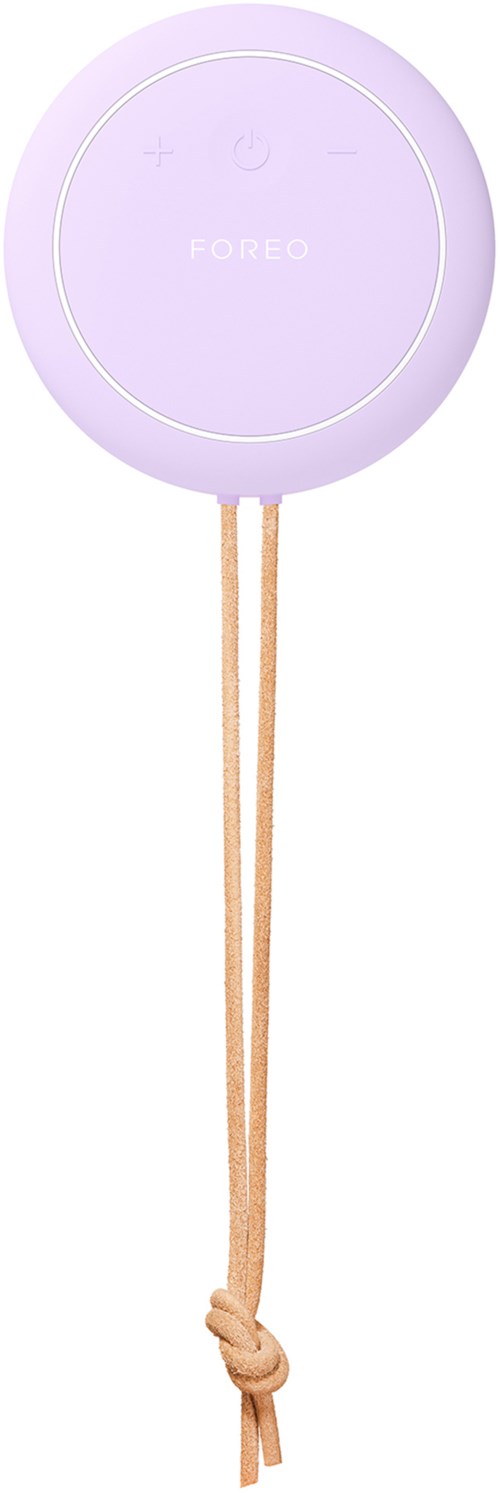 Een ronde, paarse apparaat met bedieningsknoppen aan de bovenkant, verbonden met een beige koord die in een knoop is gebonden.