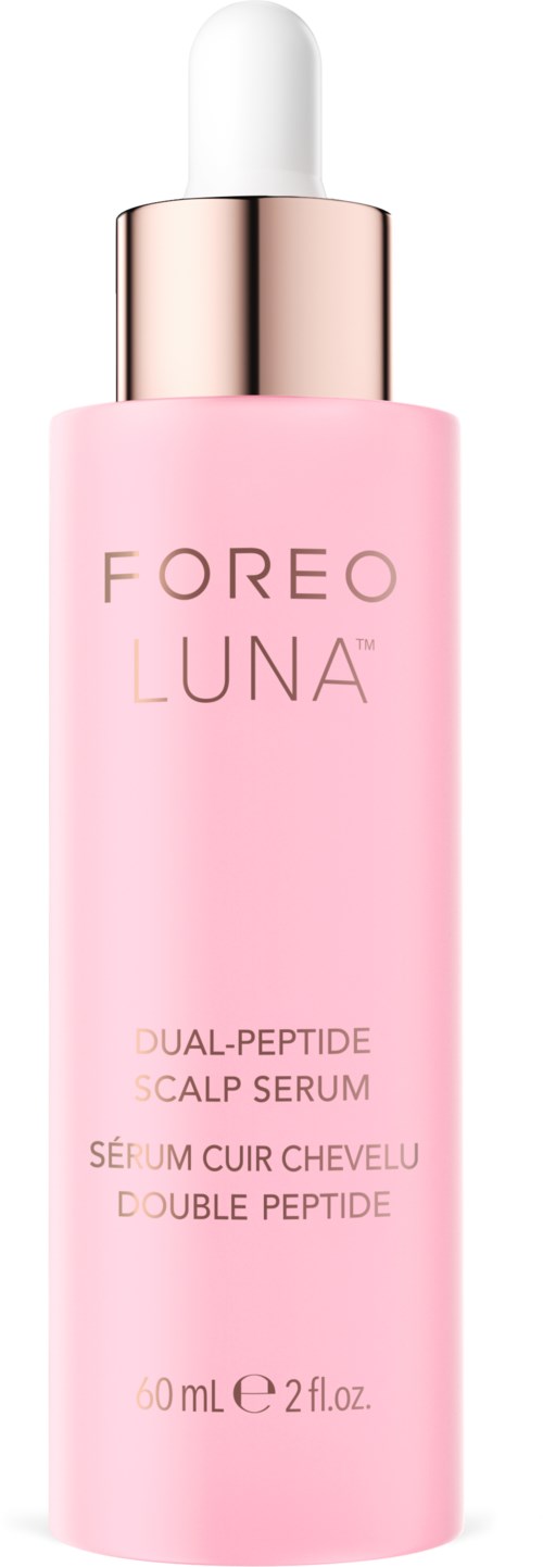 Roze fles met FOREO LUNA scalp serum met een witte en roségouden druppelkap.