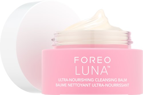 Roze pot met huidverzorgingscrème gemarkeerd "Foreo Luna" met wat crème bovenop.