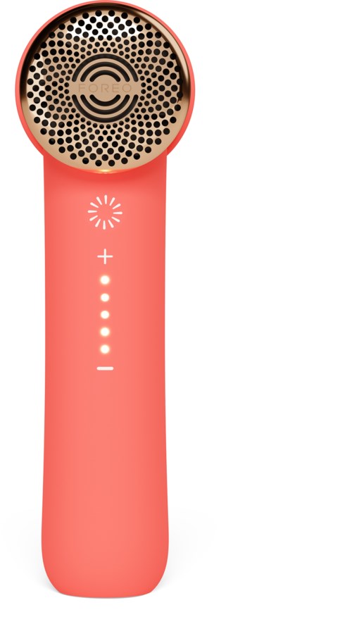 Een roze draagbaar apparaat met een ronde kop, veel kleine gaatjes en symbolen voor aan- en uitzetten.