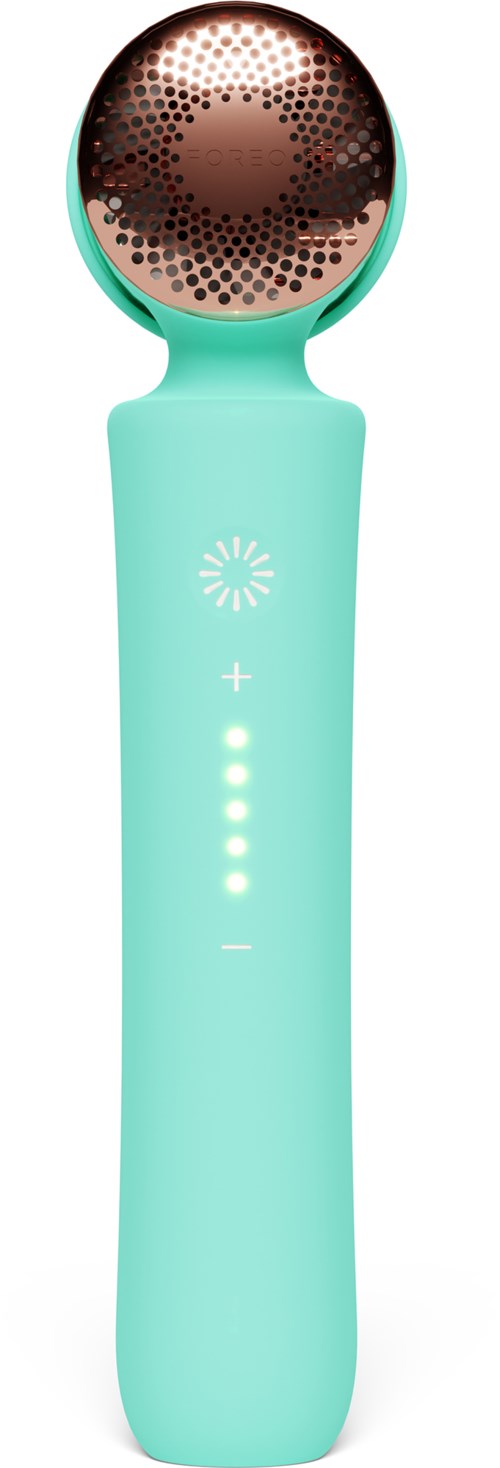 Een turquoise gezichtsreinigingsborstel met ronde, textuurbodem en LED-indicatorlichten op het handvat.