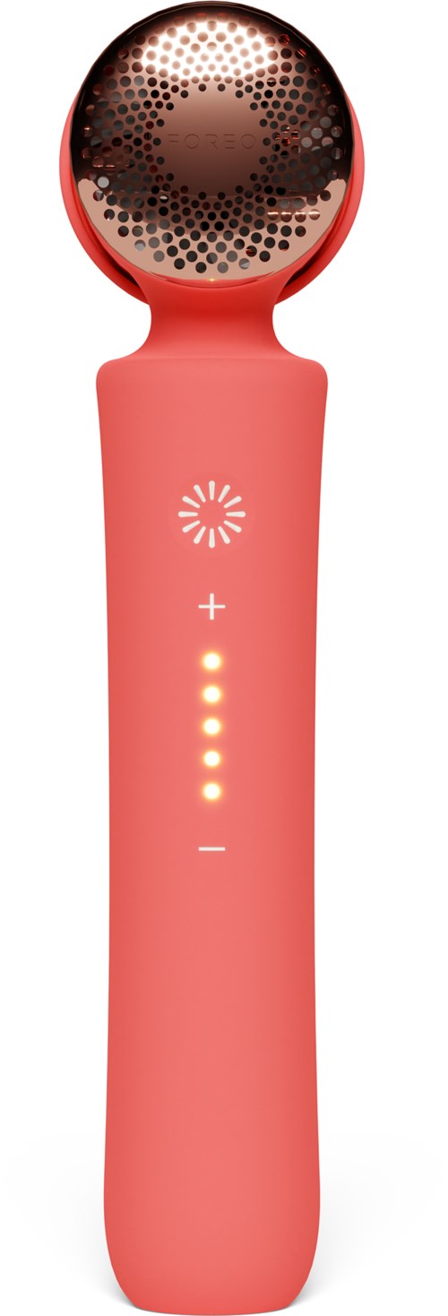 Een roze huidverzorgingsapparaat met een ronde, getextureerde kop en zeven verticale oranje lichten op de handgreep.