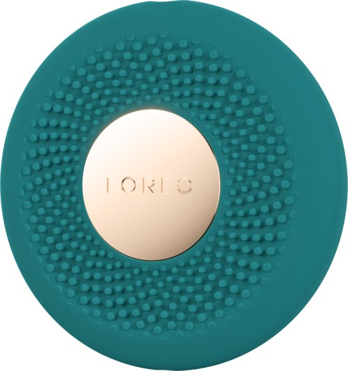 Een ronde teal siliconen voorwerp met kleine bobbels en een centrale metalen plaat met de tekst "IOREC."