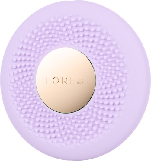 Een ronde lavendelkleurige huidverzorgingsborstel met een gouden midden met de tekst "FOREO".