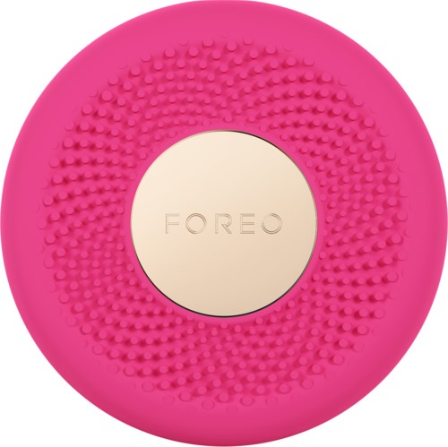 Rosa silikon ansiktsrengöringsborste med textur, centermärke med texten 'FOREO'.