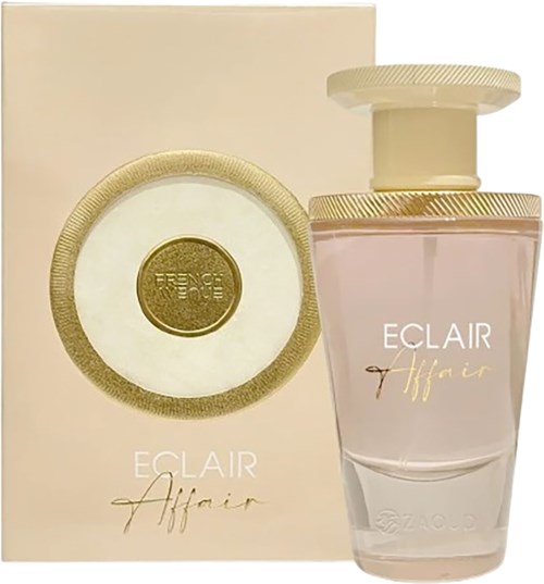 En parfyllflaska och låda märkt 'Eclair Affair', med en rund etikett på lådan och en rosa vätske Flask.