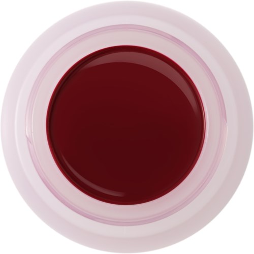 A top view of a white cup filled with dark red liquid, probably tea or juice.